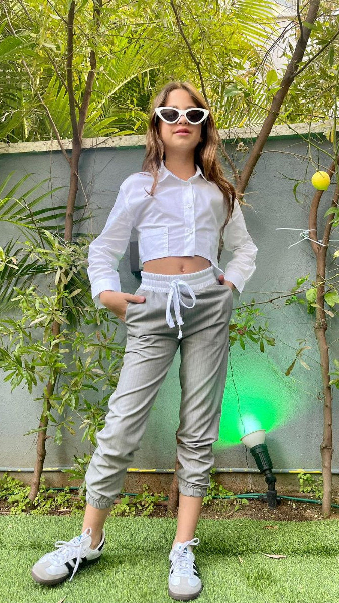 חולצה מכופתרת חצי אורך לילדה